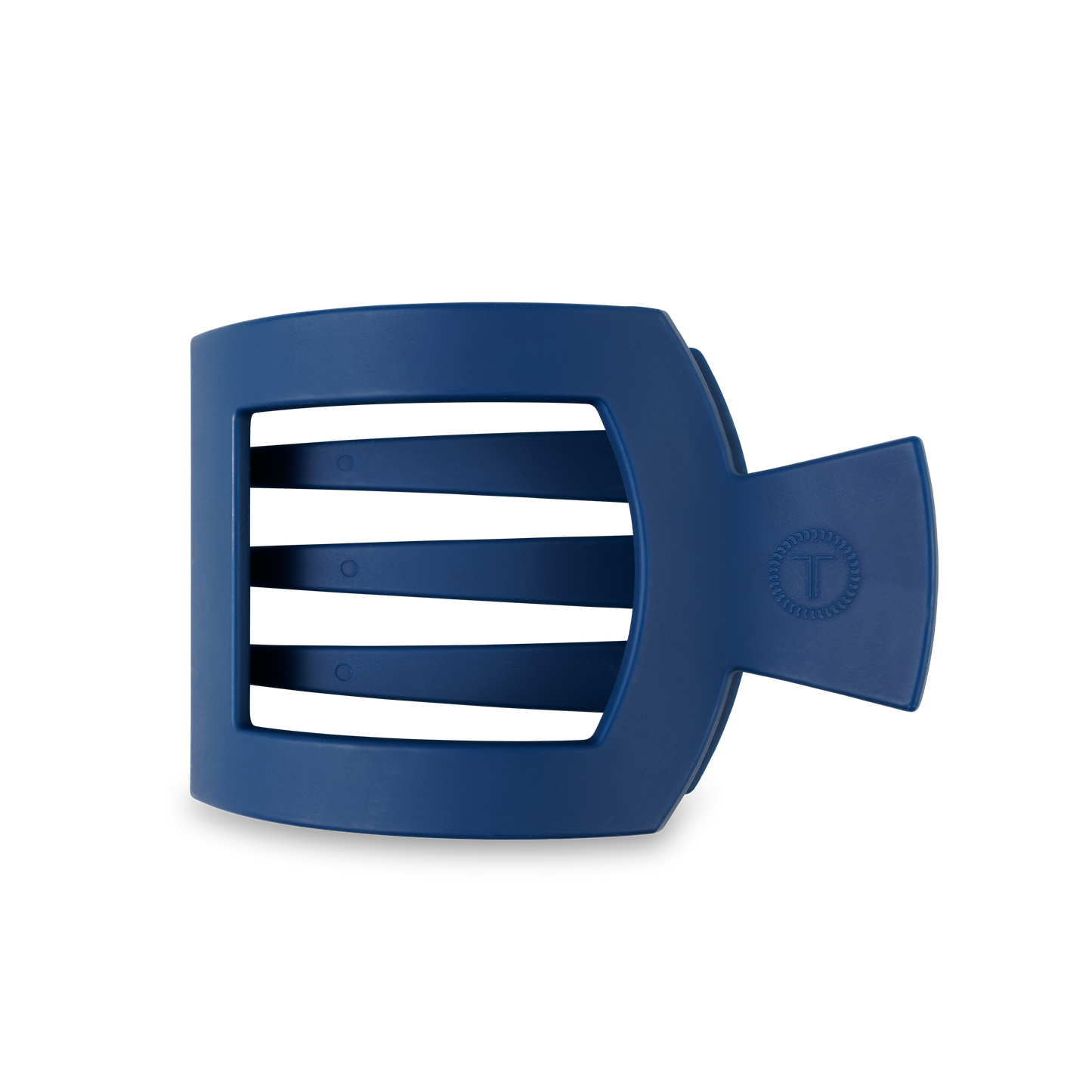 The TELETIES Square Flat Hair Clip is a blue plastic clip with a rectangular design, three horizontal bars, and a strong flat grip. Sizes available: Small and Large.