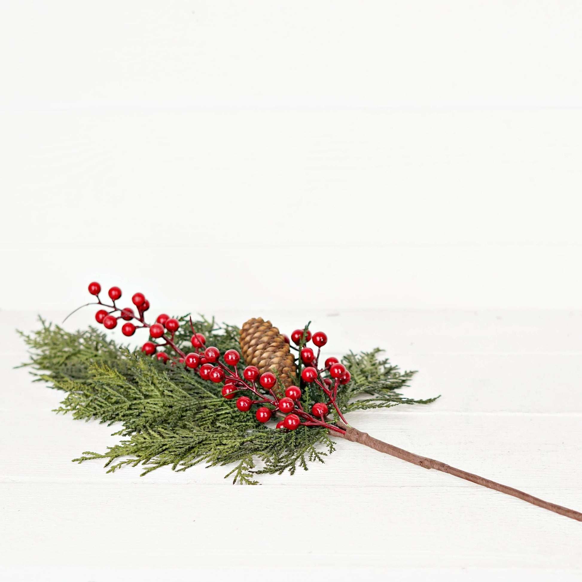 29in Superior Real Touch Mix Cedar branch with red berries; available in 29-inch size.