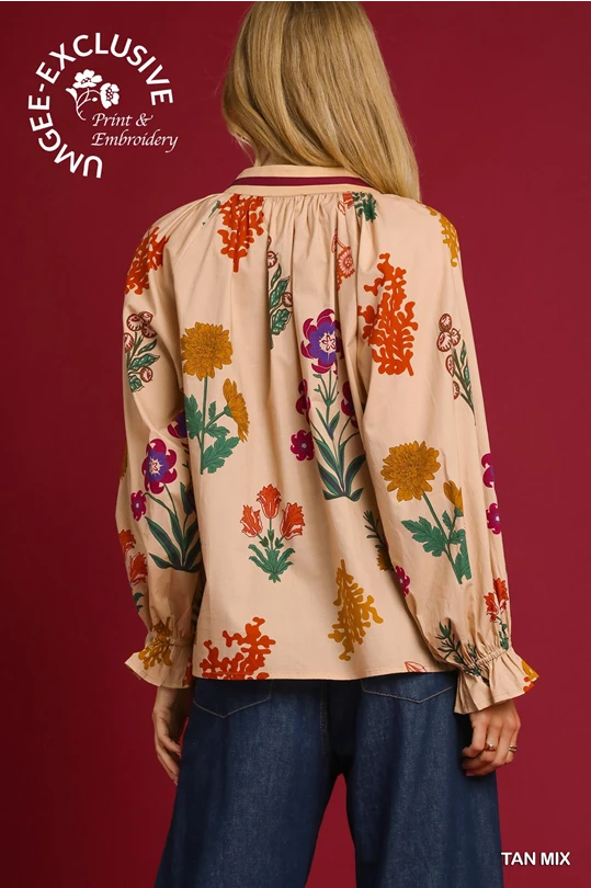 Floral Print Top with colorful embroidery, long sleeves, and loose fit. Available in sizes XS-XL.