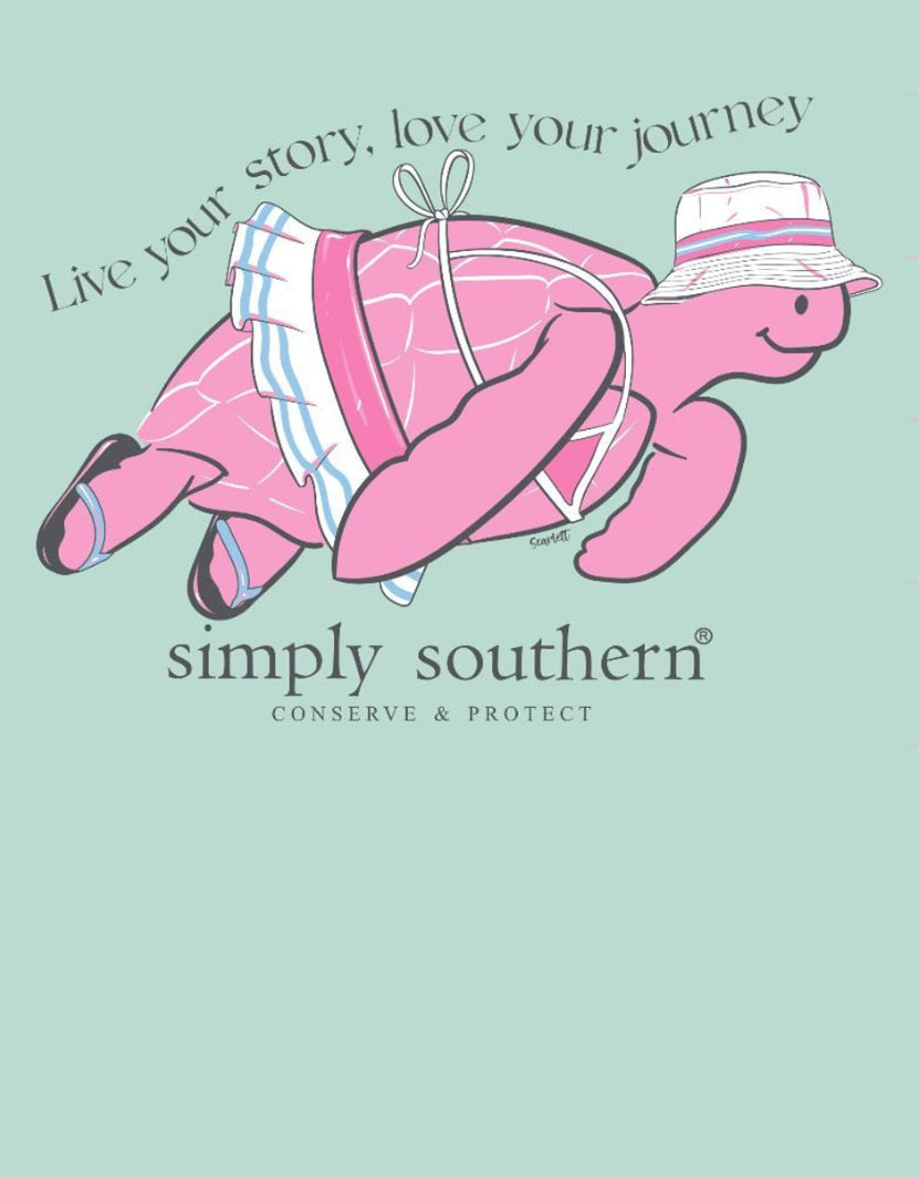 Illustration of a pink turtle wearing a white hat and a backpack, with the text "live your story, love your journey" and "Simply Southern - conserve & protect" on a green background featured on the BKNI-CHINCHILLA T-Shirt.