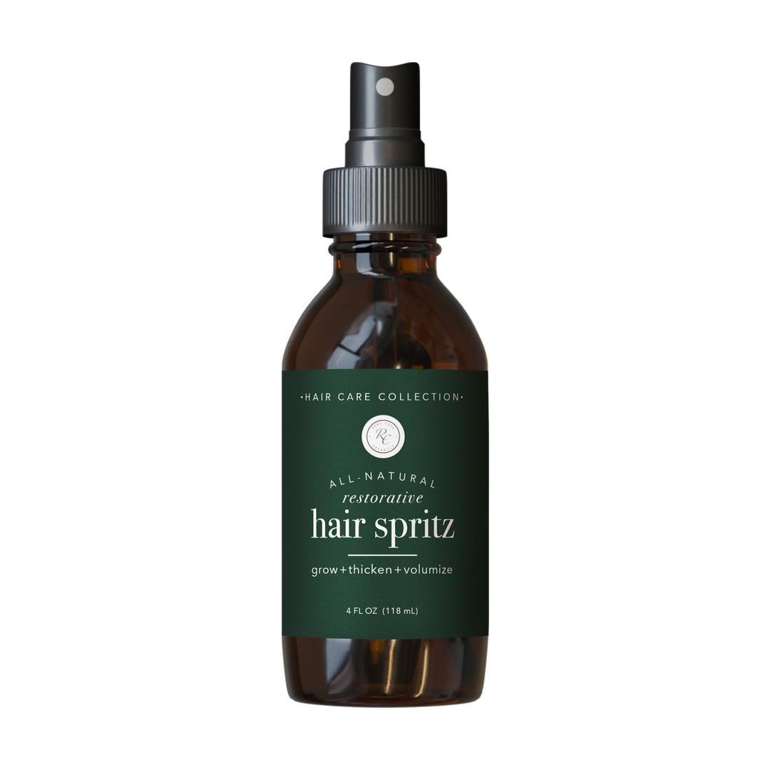 Brown 4 oz spray bottle labeled “Hair Spritz” for hair care with “grow + thicken + volumize” text, available in 4 oz size.