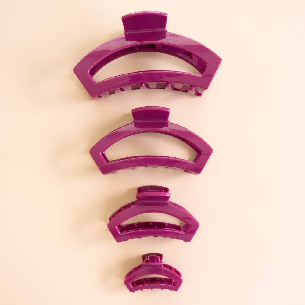 Set of four Open Mulberry Small Hair Clips in increasing sizes. Sizes: small to large.