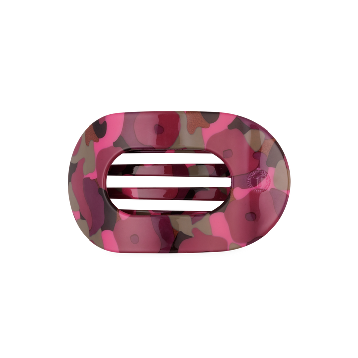 Garden Glam Medium Flat Round Hair Clip, oval-shaped with three horizontal slits and a pink, red, and brown camouflage pattern. Available in medium size.