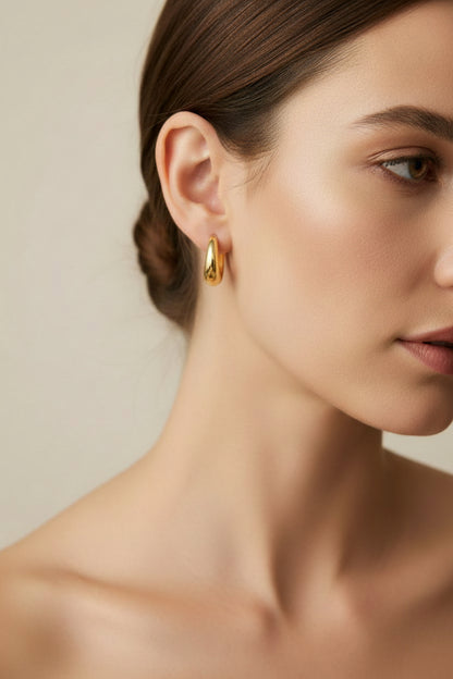 Close-up of Hoop Earrings, available in small, medium, and large sizes.