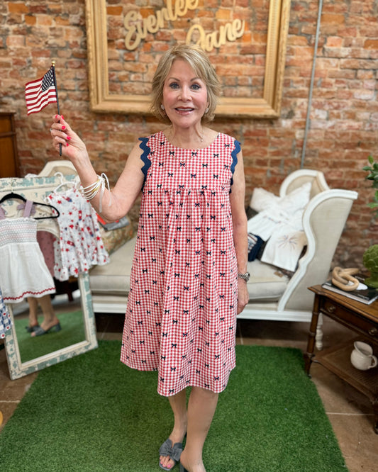 Miss Americana Bow Print Dress with blue accents. Available in sizes XS-XL.