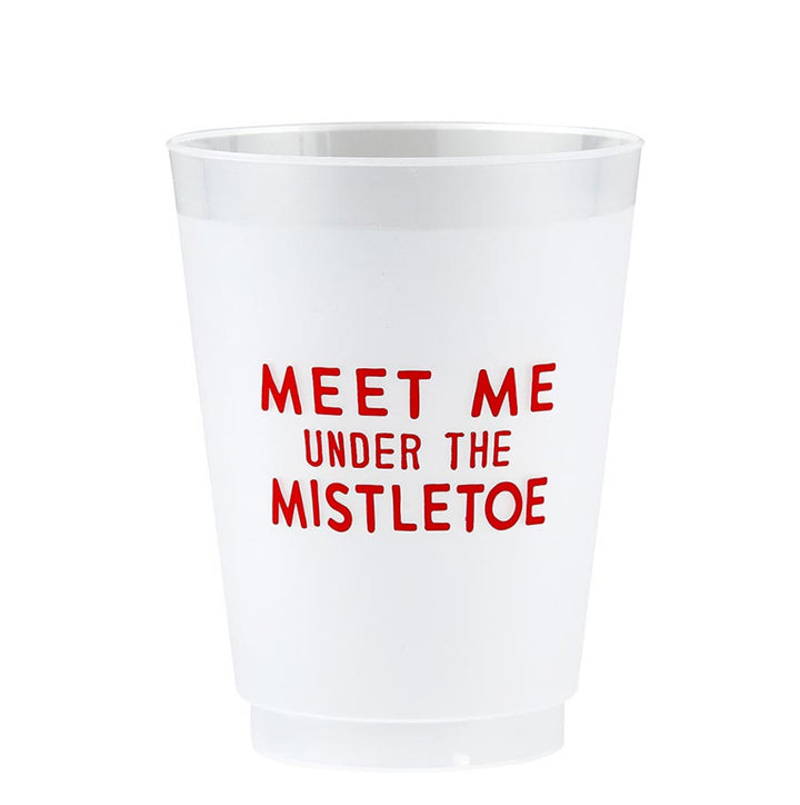 **Frosted Cups**:  
Durable, reusable frosted plastic cups with "MEET ME UNDER THE MISTLETOE" printed in red on the front. Smooth finish. Sizes available: 12 oz, 16 oz.
