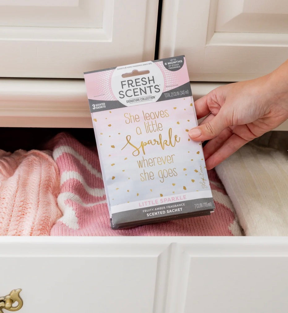 Little Sparkle Scented Sachet with the quote “She leaves a little sparkle wherever she goes.” Available in small, medium, and large sizes.