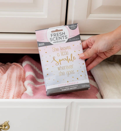 Little Sparkle Scented Sachet with the quote “She leaves a little sparkle wherever she goes.” Available in small, medium, and large sizes.