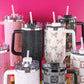 Sparkle Rhinestone Tumblers, 30 oz, with handles, straws, rhinestone or patterned exteriors in pink, black, gold, and white.