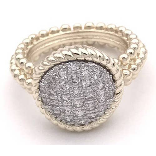 The Maddie Ring, size 6, has a gold beaded band, round textured center with clear stones, and a twisted gold rope border.