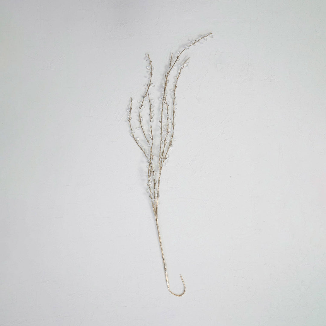 Champagne-colored faux twig spray with clear acrylic jewels and glitter.