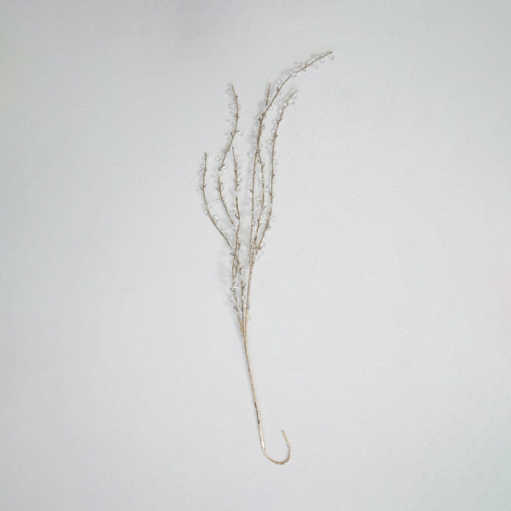 Champagne-colored faux twig spray with clear acrylic jewels and glitter.