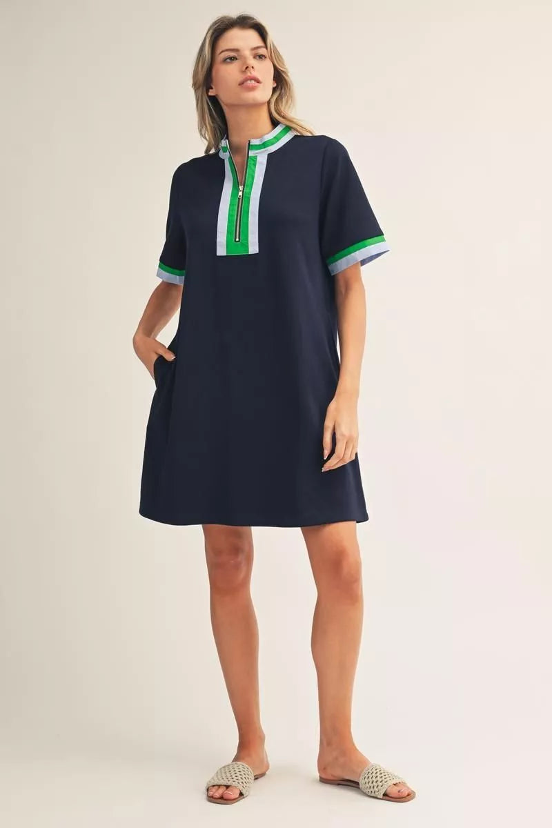Short Sleeve Navy Zip Up Dress with sporty green and white trim on collar and cuffs; available in sizes XS-XL.