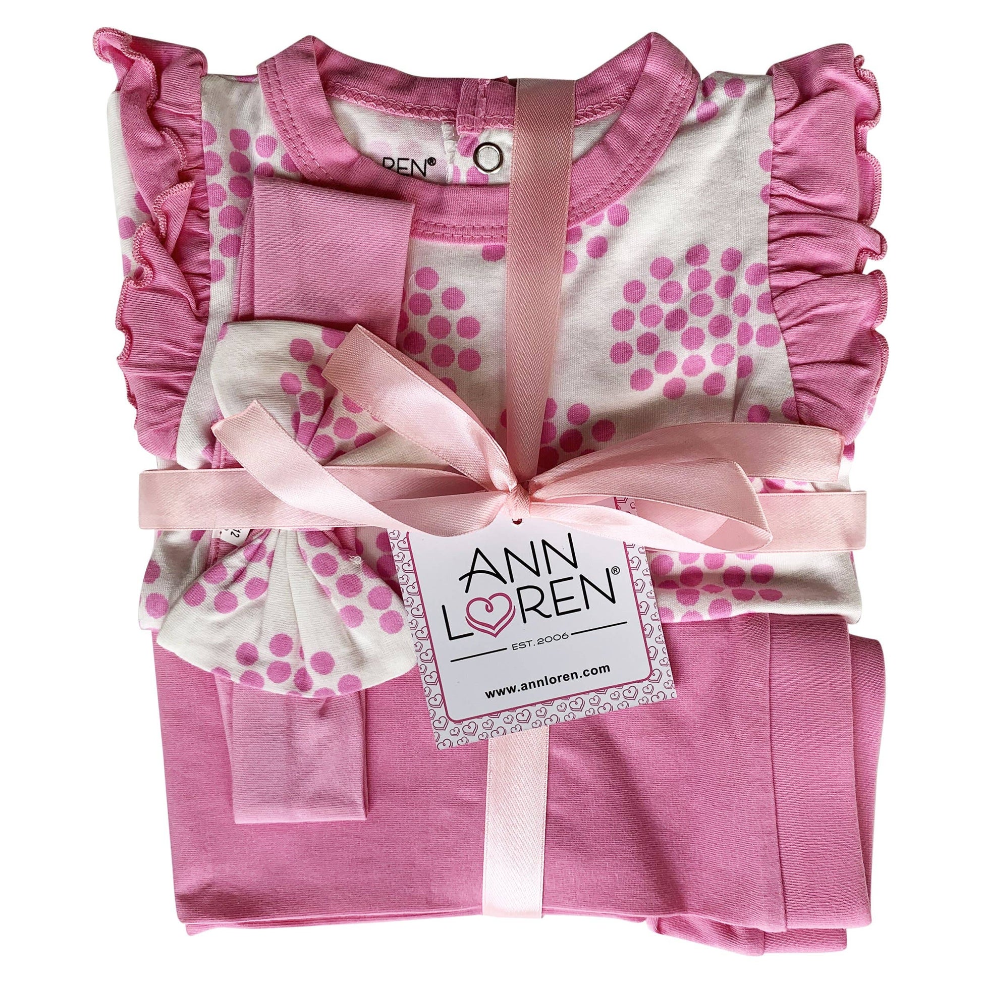 A neatly presented Layette Girls Baby clothes Shower Gift Pink Polka Dot Easter outfit tied with a pink ribbon and a tag labeled "AnnLoren design." The set includes a decorated top and matching pants crafted from Egyptian cotton.