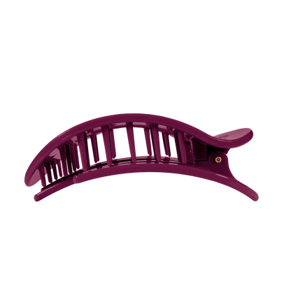 The Mulberry Large Flat Round Hair Clip is made of purple plastic with a curved, vented design and interlocking teeth; available in large size.