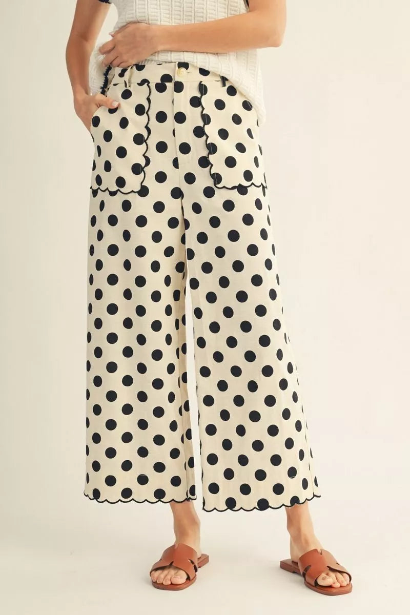 Black HW Wide Scallop Detail Polka Dot Pants with front patch pockets. Available in sizes XS-XL.