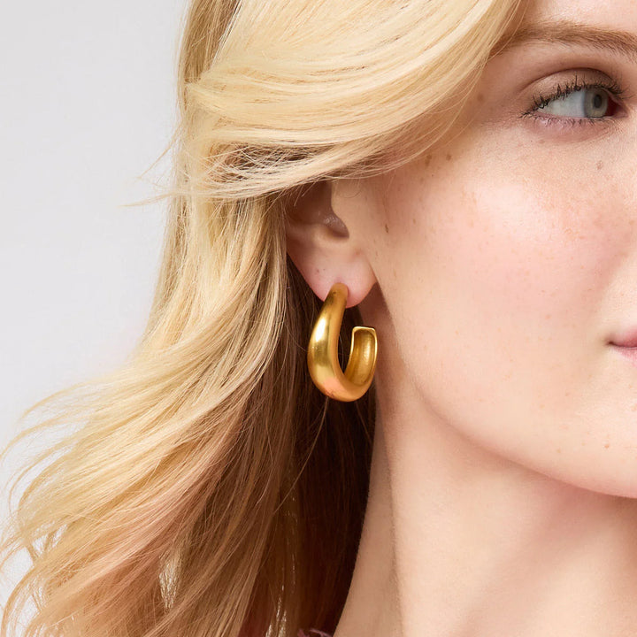 Julie Vos Wave Hoop: chunky 24K gold plated earring. Available in small, medium, and large sizes.