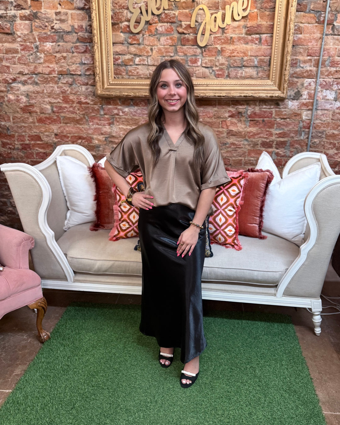 Mocha Signature Satin Top, short-sleeve mocha v-neck with cuffed sleeves.