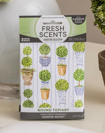 Box of Round Topiary Scented Sachets labeled “Round Topiary,” offers up to 6 months of fresh green fragrance. Available in standard sachet sizes.