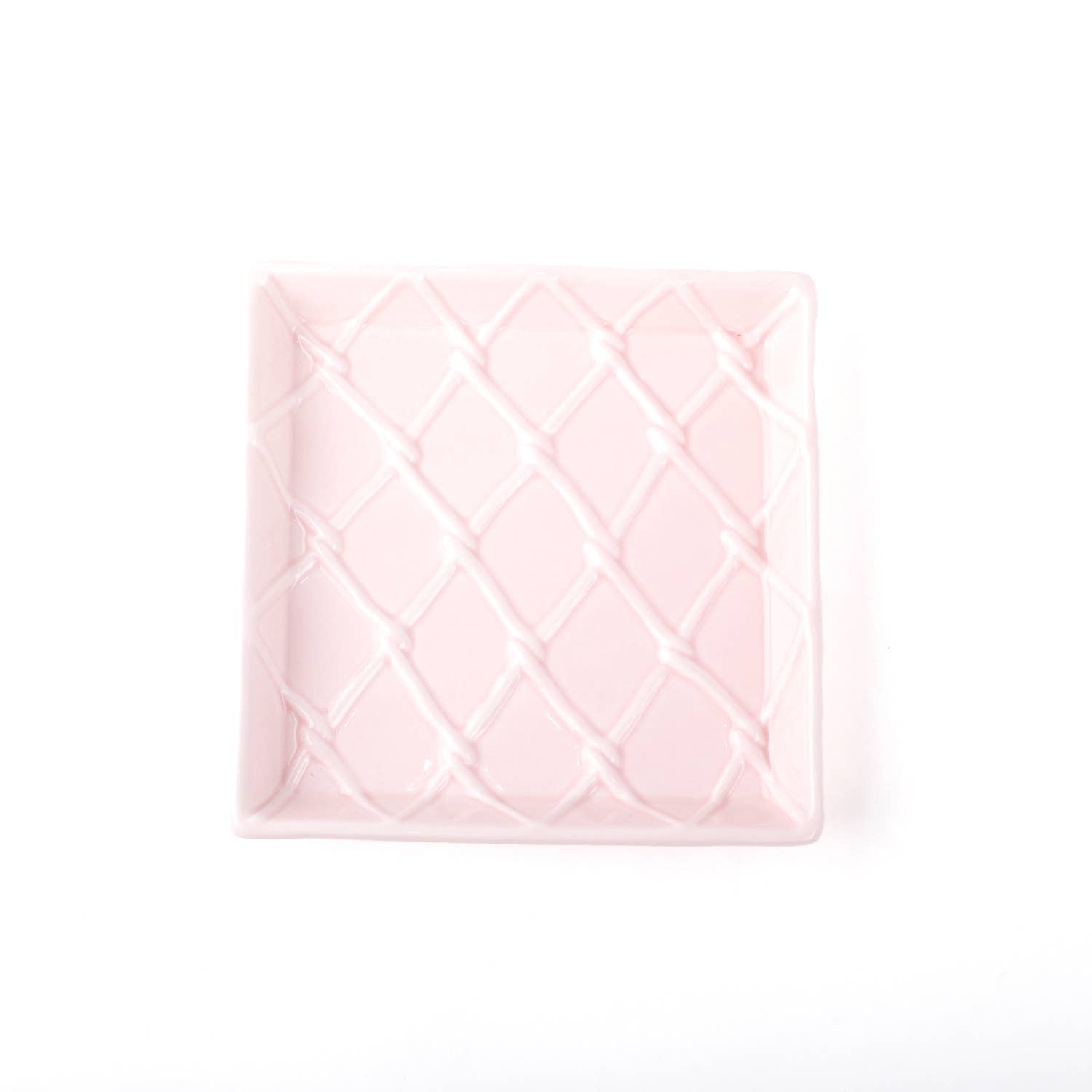 Square, light pink ceramic tray with a raised diamond pattern. Available sizes: beverage napkin tray.