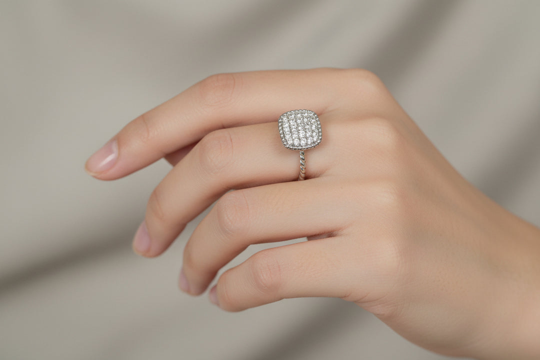 The Ring Edit: bold silver statement ring with a square cluster of diamonds. Available in sizes 5-9.