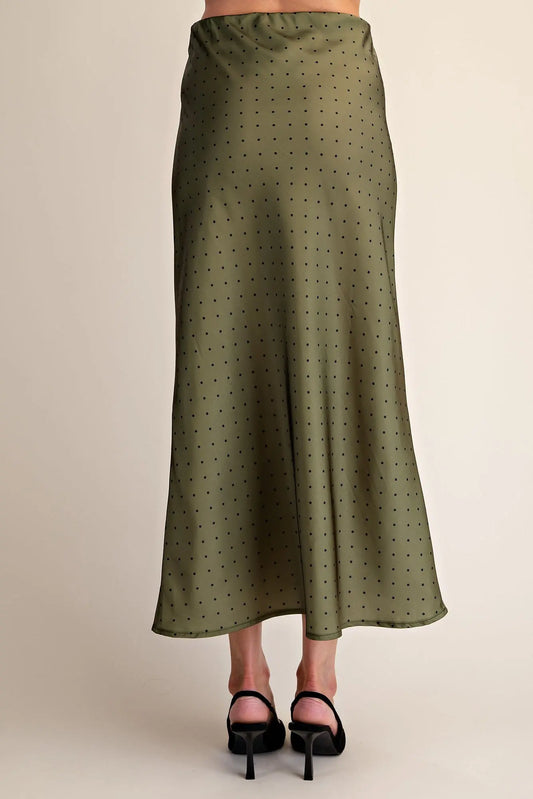 Olive green, ankle-length Polka Dot Satin Skirt with small black spots. Available in sizes XS–XL.