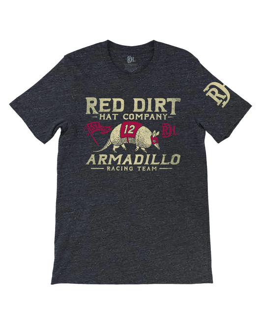 Dark heather tee with “Armadillo Racing Team” text, racing armadillo, #12 flag, red/yellow accents. Sizes S-XXL.