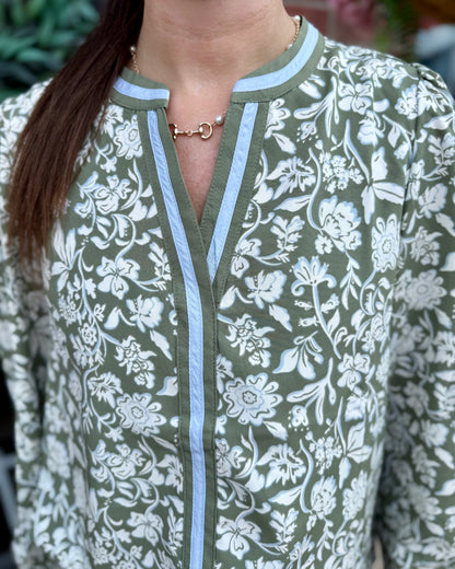 Naomi Painted Trillium Olive Top: lightweight blouse with olive green floral pattern and light blue trim on collar and neckline. Available in sizes XS-XL.