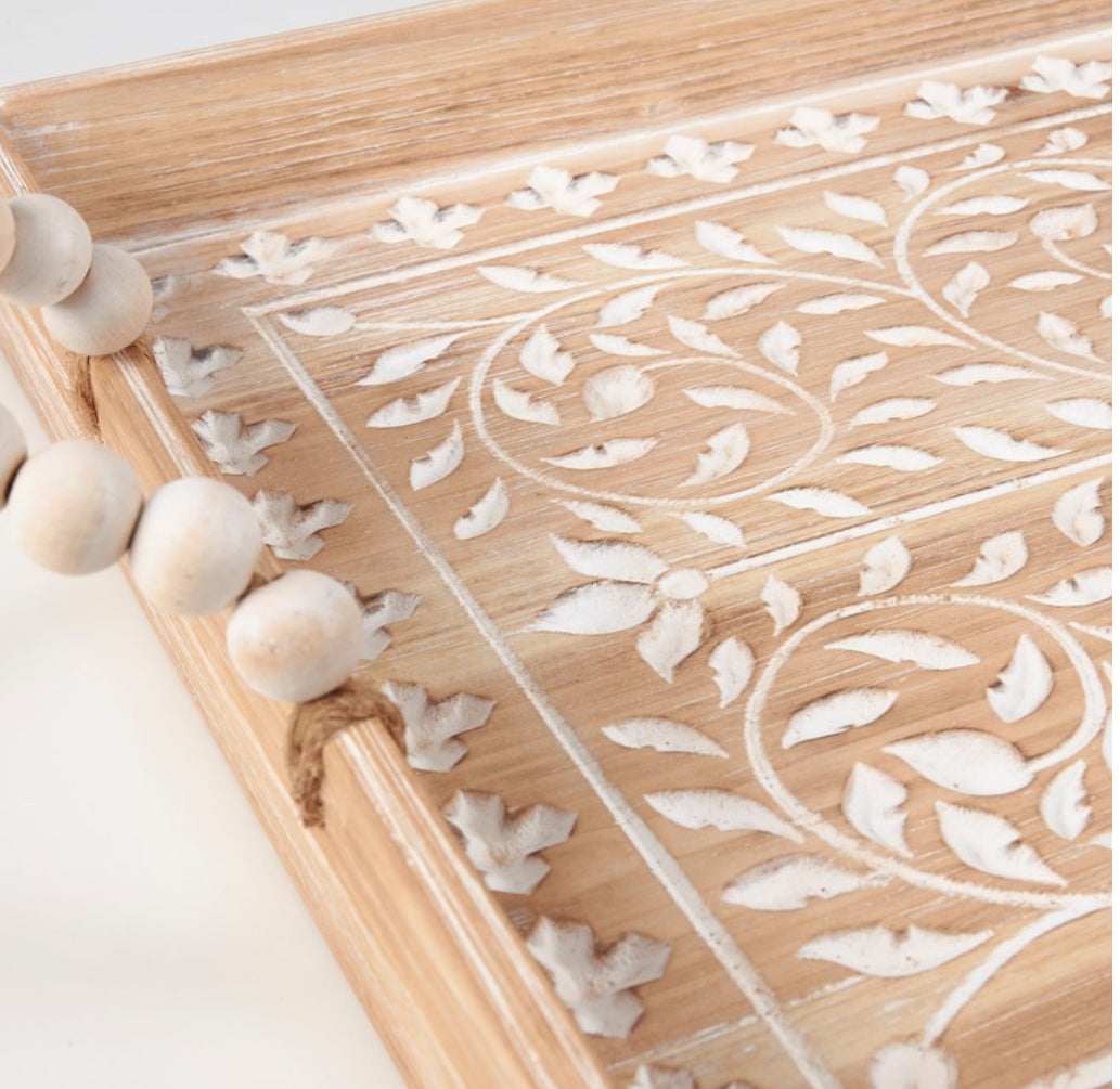 Floral Tray with white floral carvings, rope handle, wooden beads; rustic Boho style. Available in S, M, and L sizes.