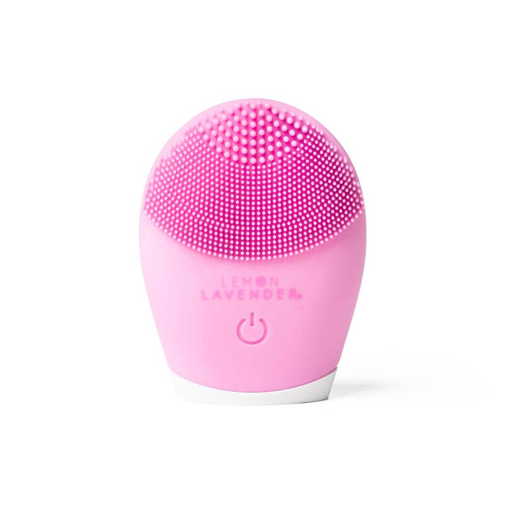 Lemon Lavender Sonic Cleanser Brush with oval shape, silicone bristles, central power button; available in standard size.