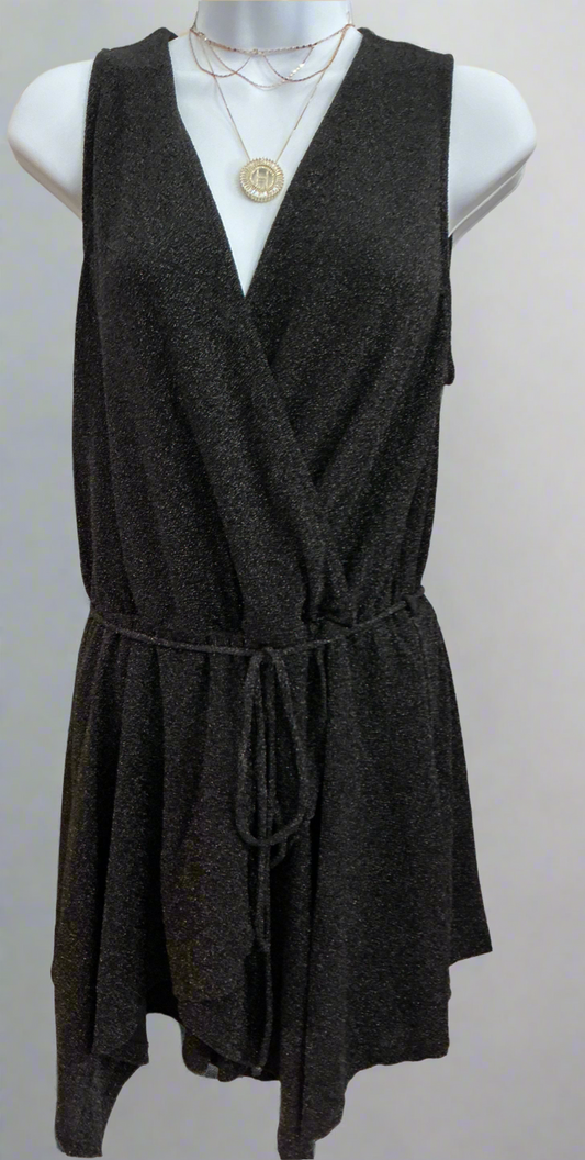 Dark grey sleeveless wrap romper with sparkly sheen, V-neck, drawstring waist, and flowy skirt. Available in sizes S-XL.