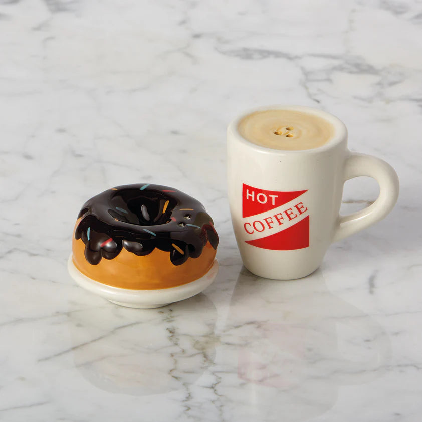 Ceramic donut with chocolate glaze and white mug labeled "HOT COFFEE" salt & pepper shakers. Sizes available: standard.