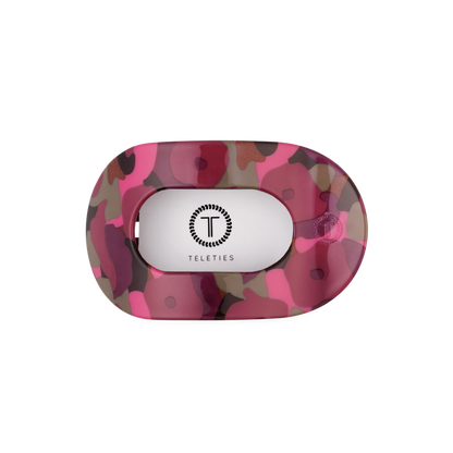 Garden Glam Medium Flat Round Hair Clip with a pink, brown, and purple camouflage pattern in an oval shape, flat back, and TELETIES logo in the center. Available in medium size.