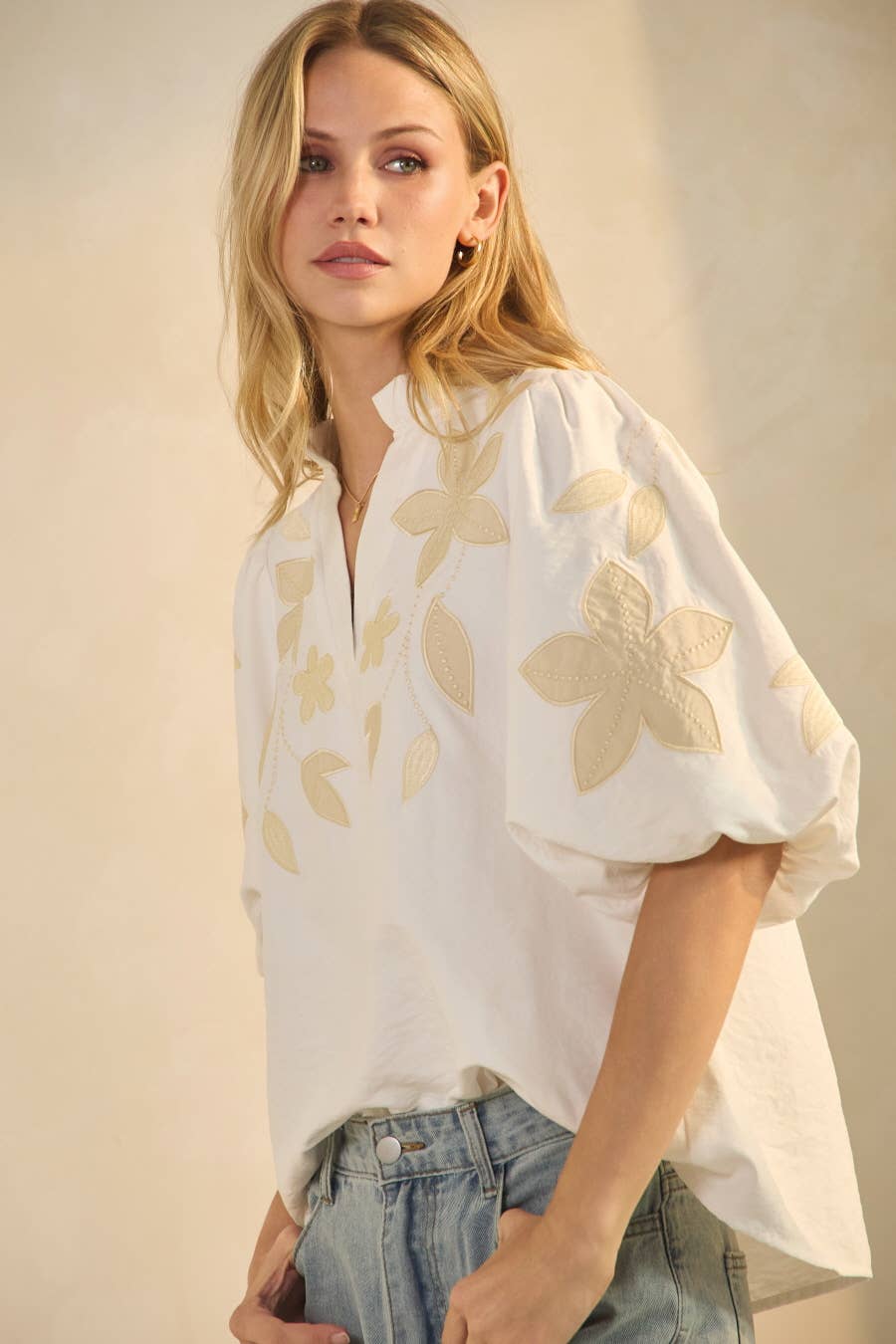 Washed suede camel top, available in size S.