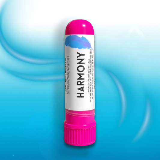 Harmony Inhaler with bright pink cap and base, blue brushstroke above label. Available in regular and mini sizes.