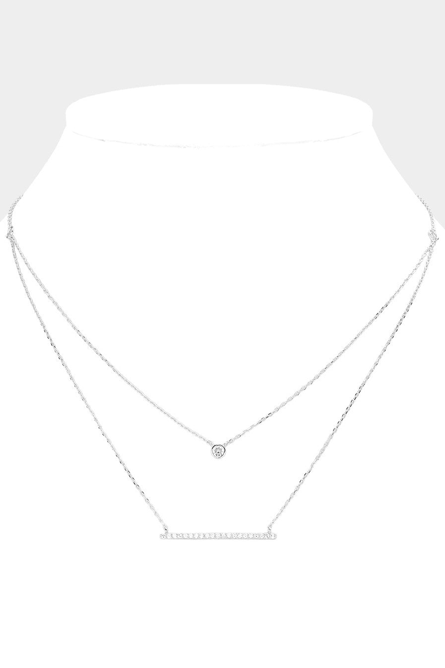 Secret Box Bar Pendant Brass Layered Necklace. Delicate silver double-layered design. Short chain with circular charm, long chain with stone-pointed bar pendant. Thin and minimalist. Sizes available: One size fits all.