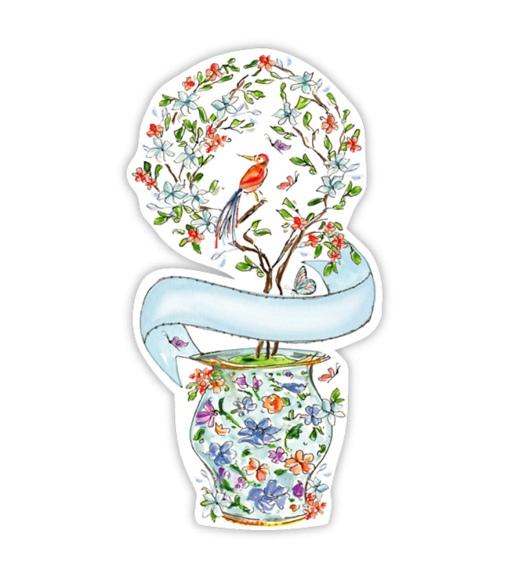 Die Cut Accents: Colorful illustration of a floral vase with blooming branches and a perched bird. Blue ribbon encircles the vase. Available Sizes: One Size Only.