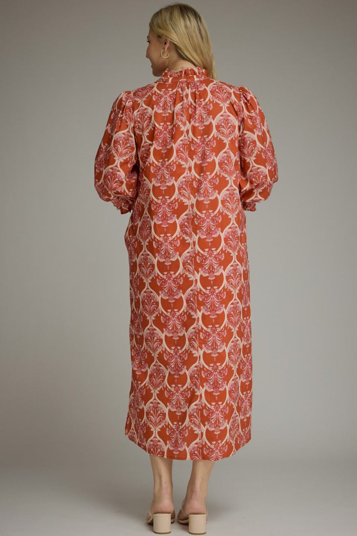 Nora Ruffle Midi Dress in orange and white damask print with balloon sleeves and ruffled neckline. Available in various sizes.