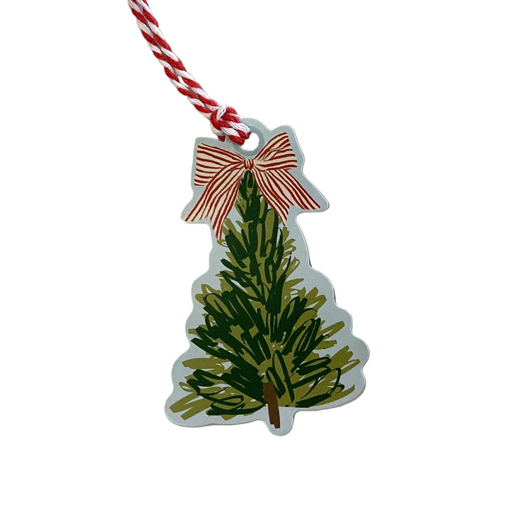 Die-cut Christmas tree gift tag with a red and white striped bow and twisted cord.