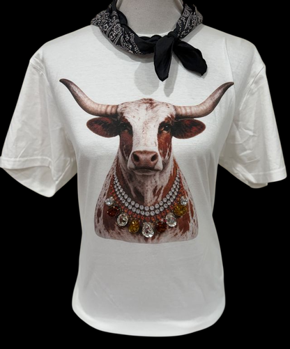 White crew tee featuring a graphic of a longhorn cow with a jeweled collar. Available in sizes S-XL.