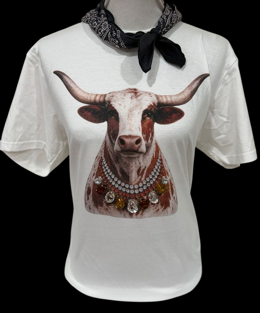 White crew tee featuring a graphic of a longhorn cow with a jeweled collar. Available in sizes S-XL.