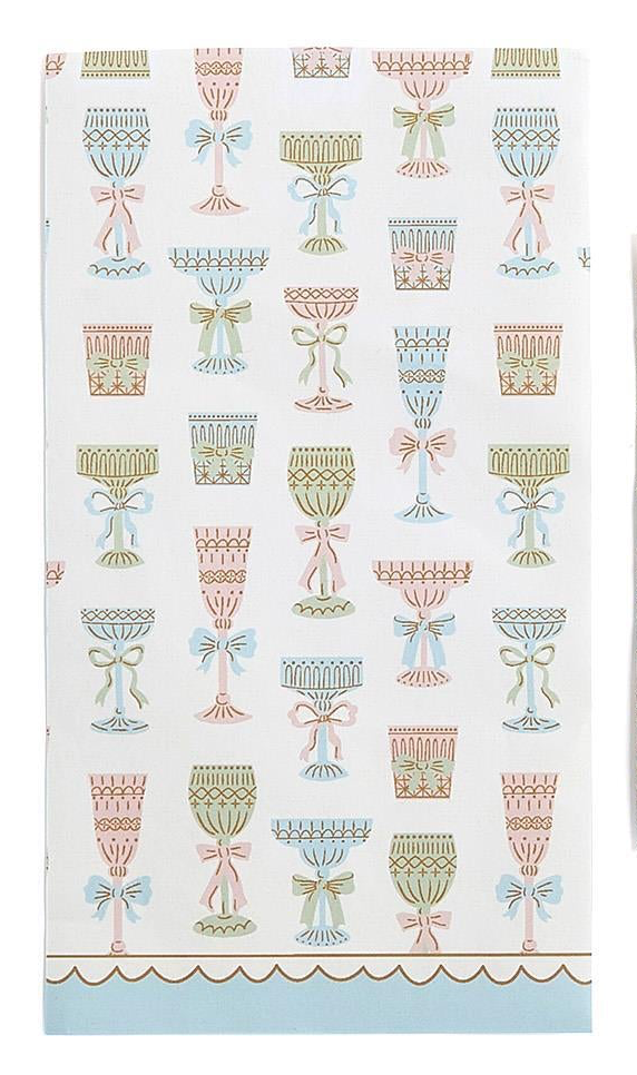 White Cheers! paper dinner napkin/guest towels with pastel pink, blue, and green goblet and bow designs; blue bottom border with scalloped brown line. Available in standard guest towel size.