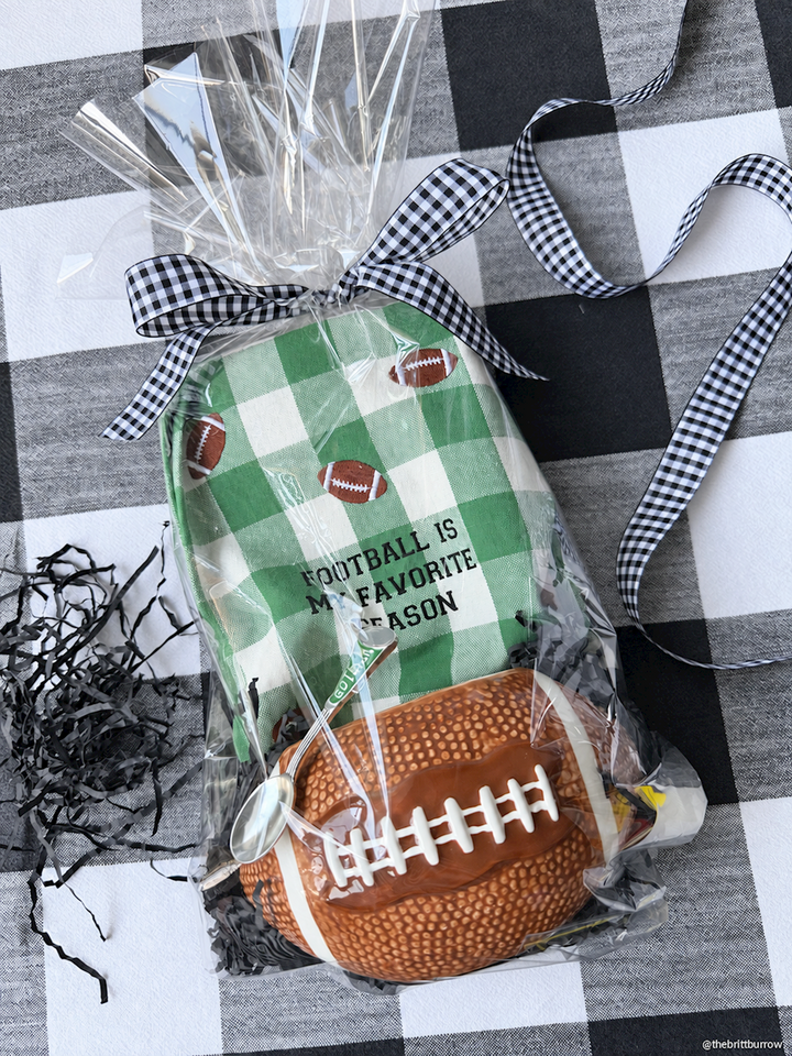 Game Day Dip Bowl shaped like a football, available in small and large sizes.