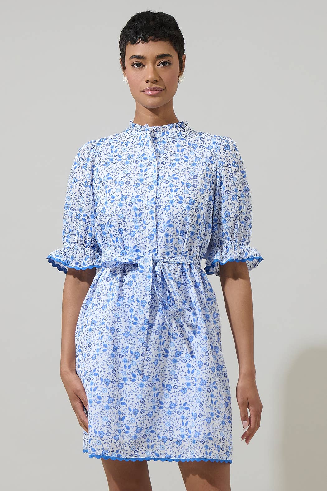 Maisie Floral Miana Button Up Dress: white with blue floral print, puff sleeves, tie waist. Available in sizes XS-XL.