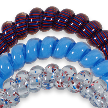 Large spiral hair coils: translucent red/blue striped, solid blue, clear with red/blue glitter. Available in large size.