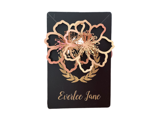 Elegant gold and pink floral stud earrings with intricate petals; available in small, medium, and large sizes.