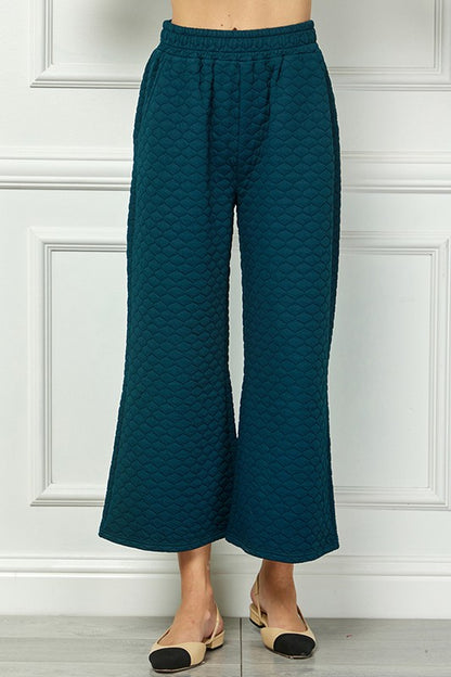 Teal quilted wide-leg pants from the Honey Comb Textured Set, available in sizes XS-XL.