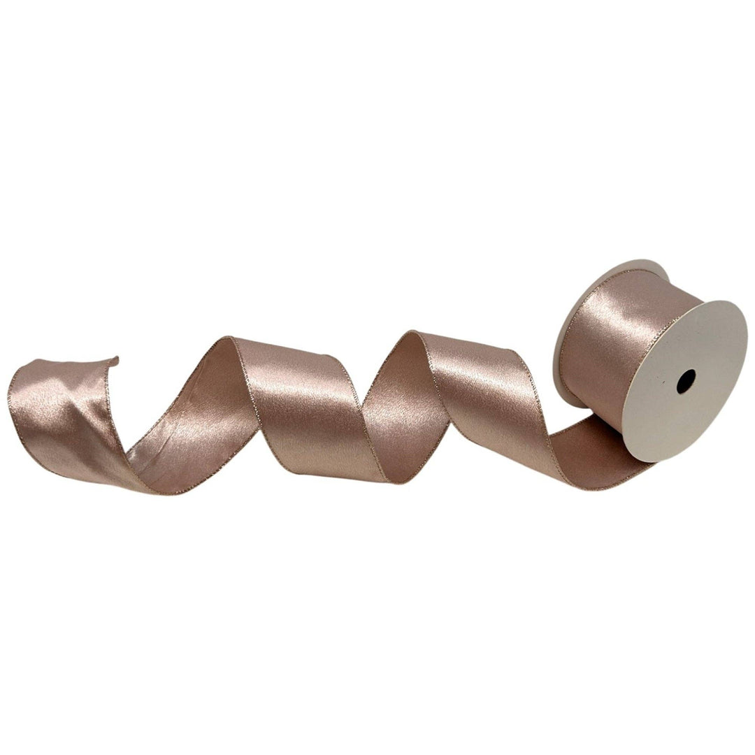 Rose Pink Satin Ribbon with rose gold edges, satin finish, size 2.5″ x 10yd, partially unrolled.