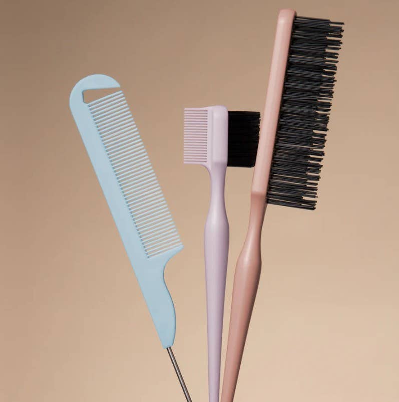 Detail &amp; Define Styling Brush Set including a light blue pintail comb, lavender dual-sided edge brush, and rose pink teasing comb.