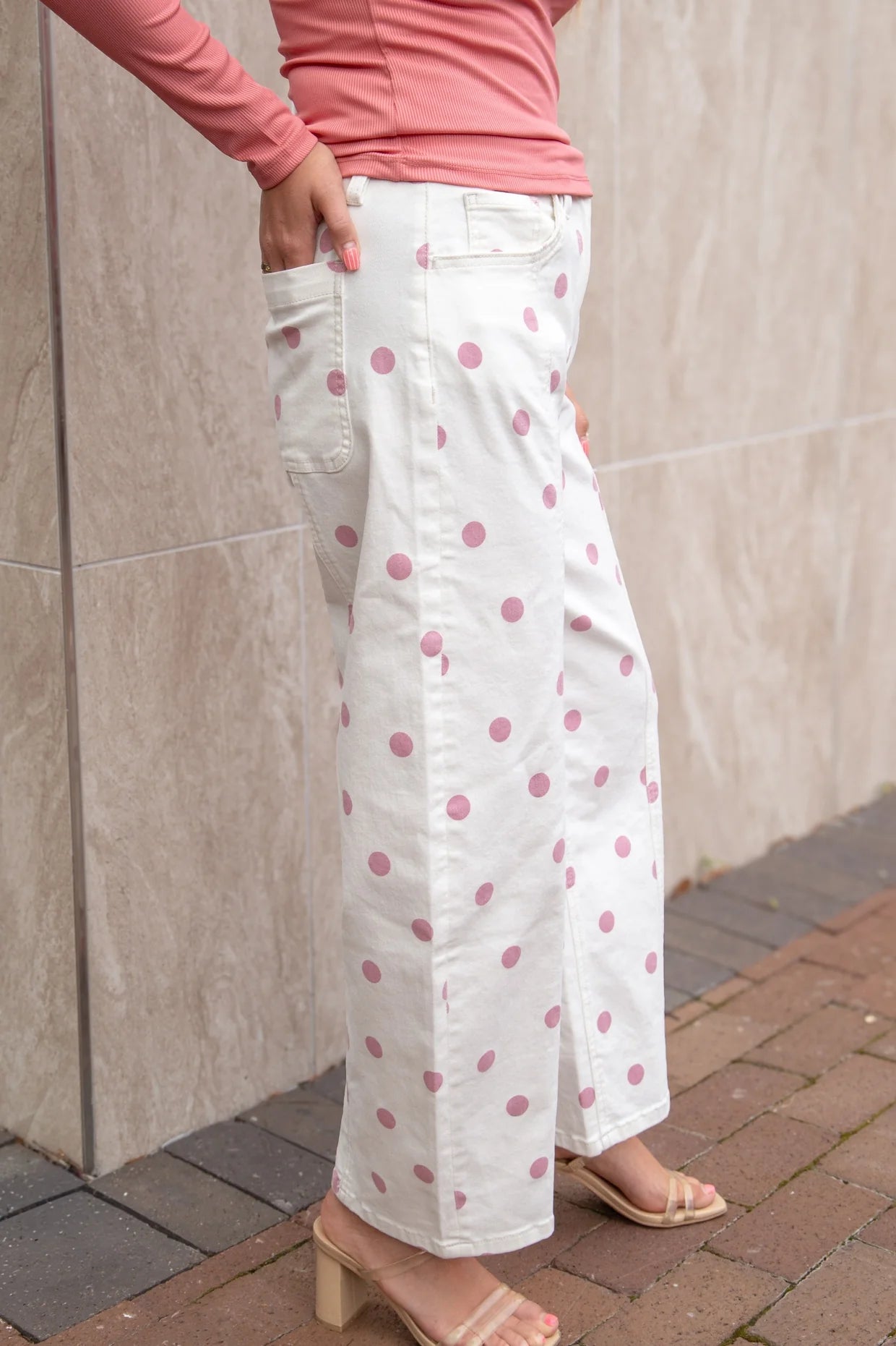 Pink Polka Dot Barrel Jeans in stretch denim; available in sizes XS-XL.